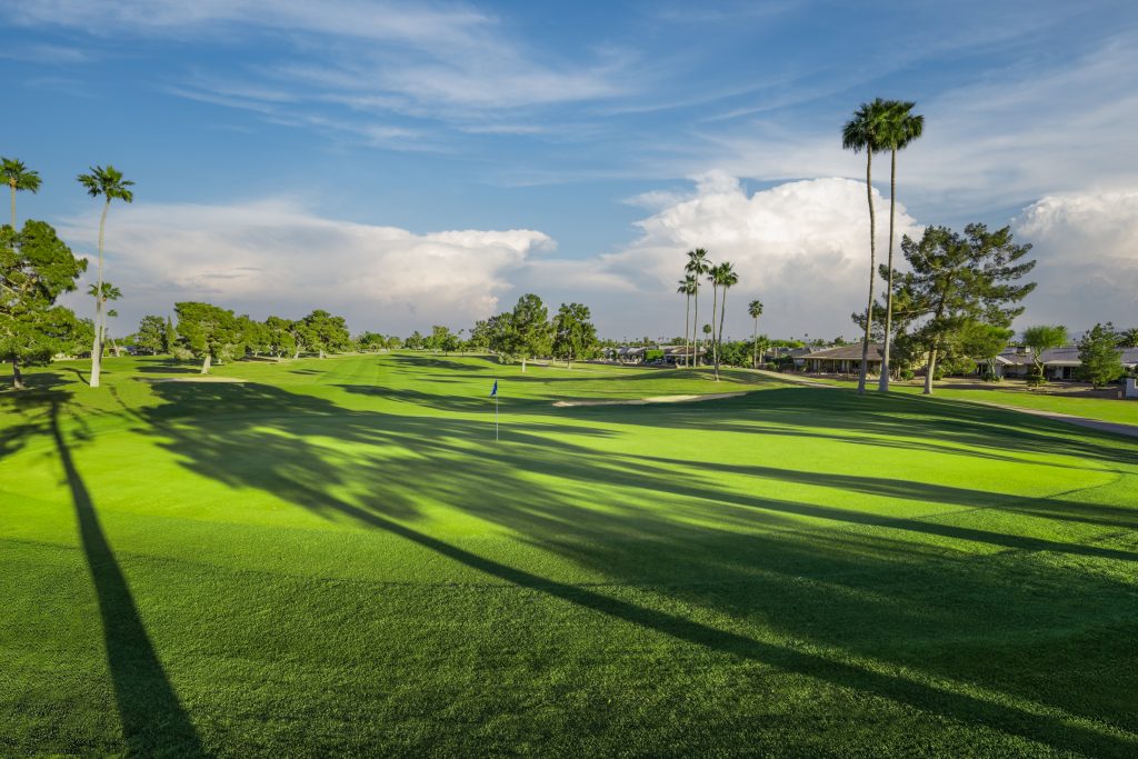 Long morning shadows across a fairway at Union Hills Golf Club in Sun City, AZ