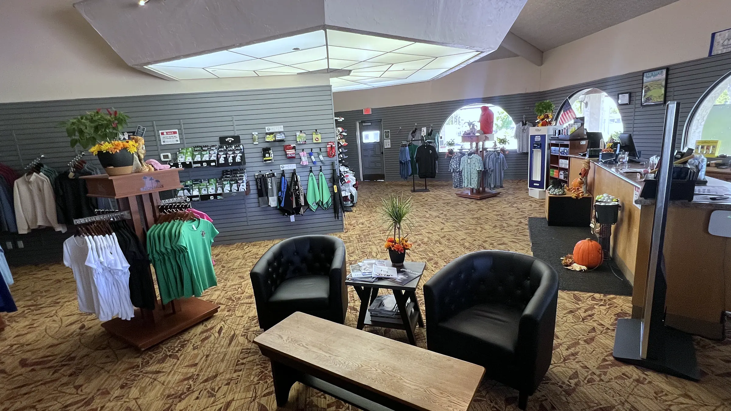 Lounge seating and apparel displays in the Union Hills golf shop