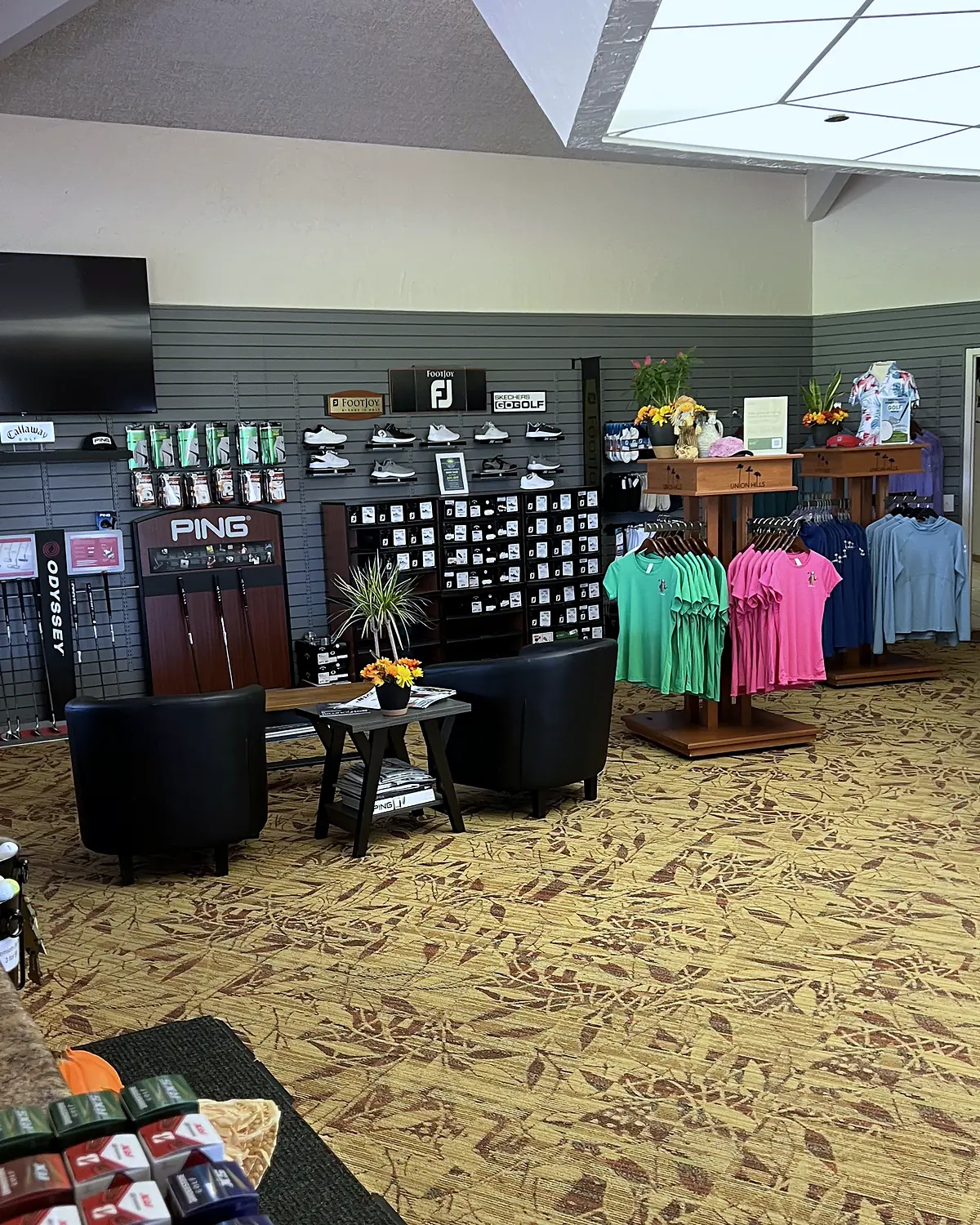 PING and FootJoy displays in the Union Hills golf shop