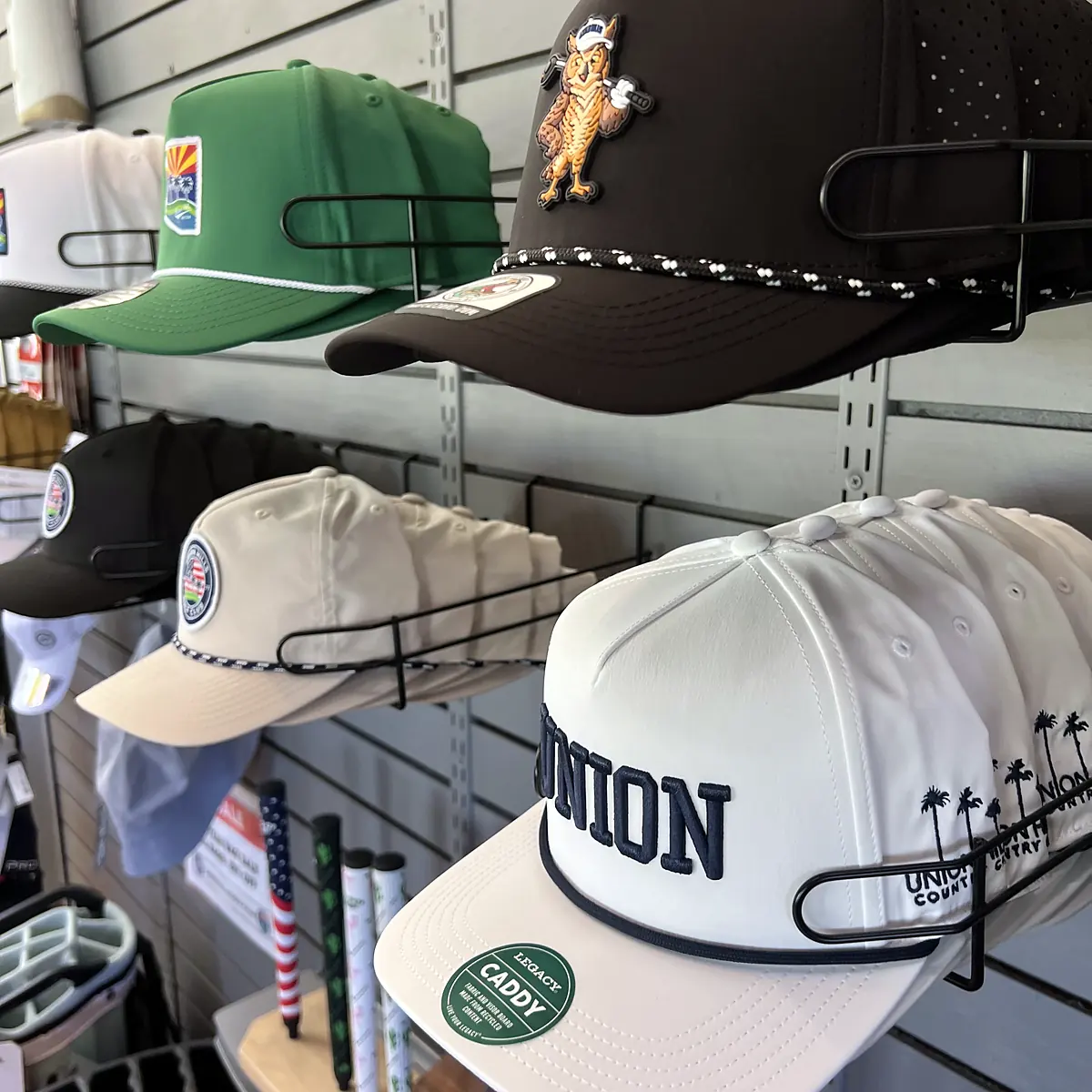 Union Hills rope hats and logo caps on display
